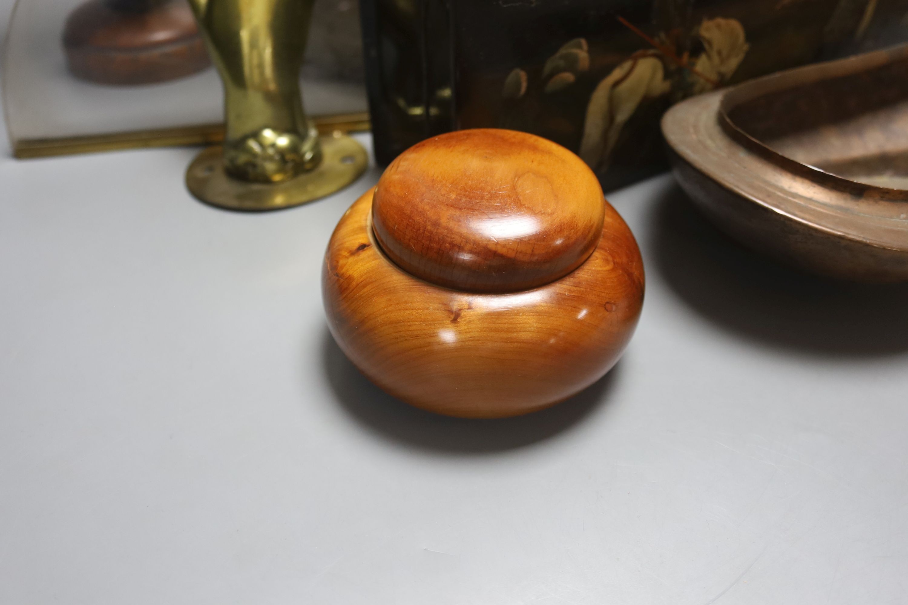 A Russian papier mache box, 26.5cm, an embossed leather stick stand, a Persian painted wood vase, metalware etc